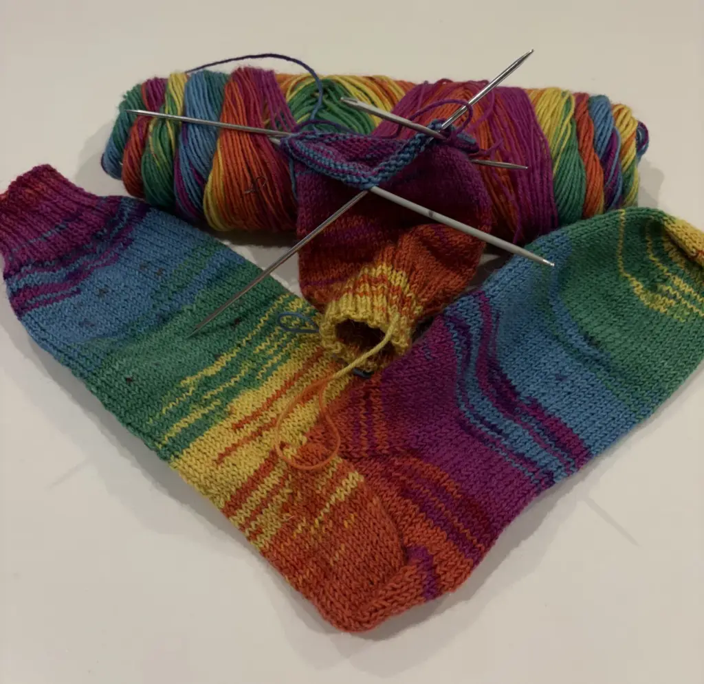 These are hand knitted multi-colour socks