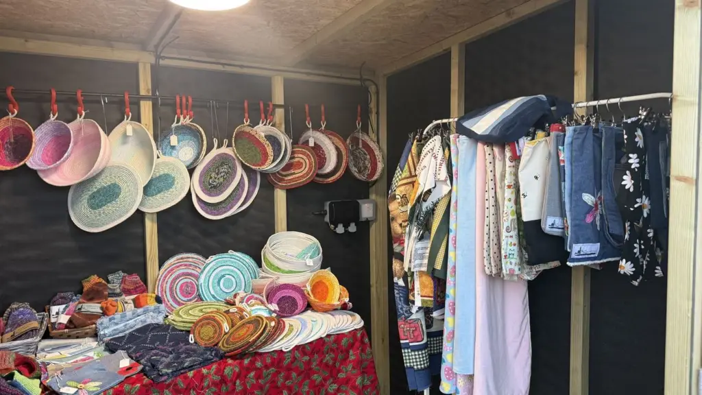 Rope bowls, bags and sewn pieces on display at the stall
